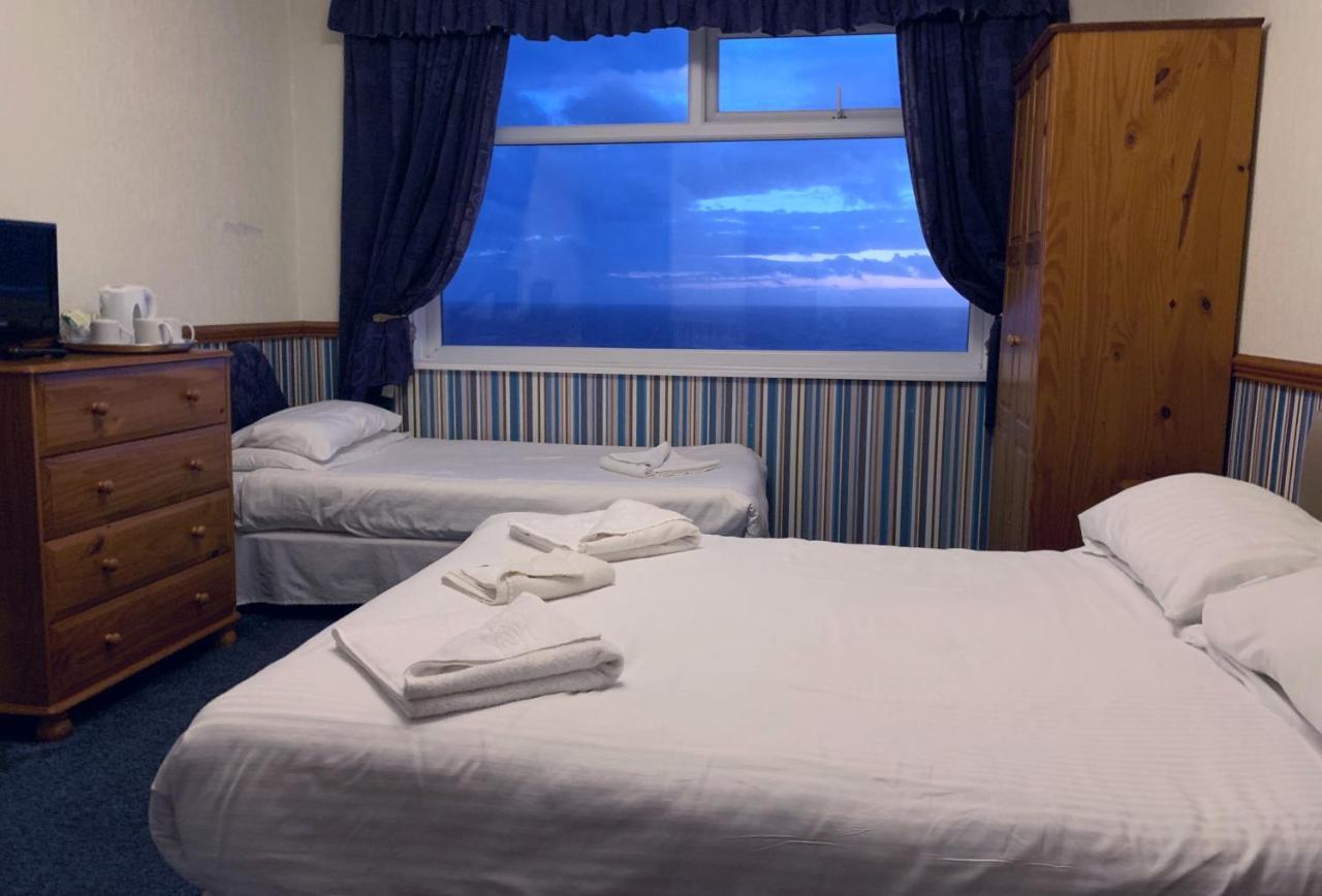 Deluxe Triple Room Sea View,1014608569:JPEG