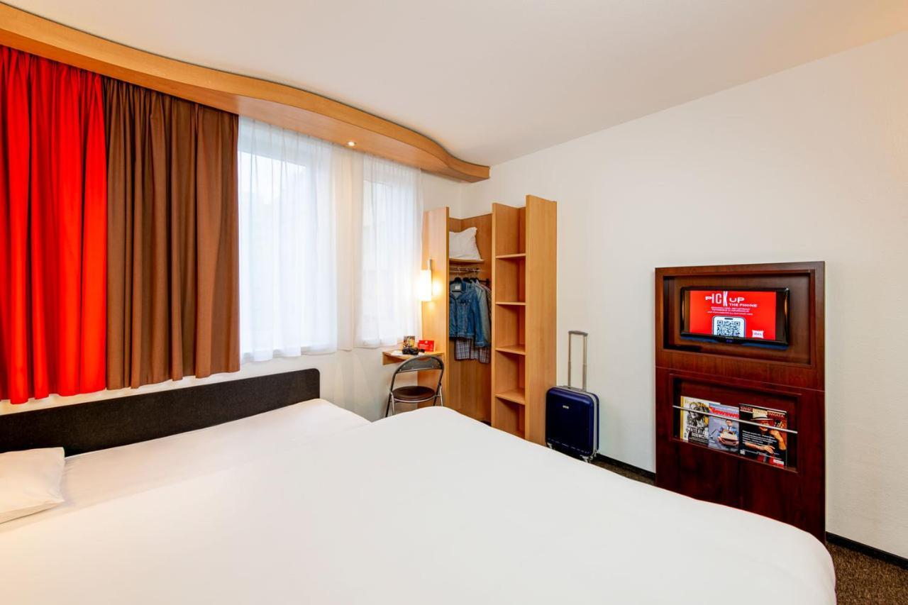 Classic Familiekamer met Tweepersoonsbed en Slaapbank