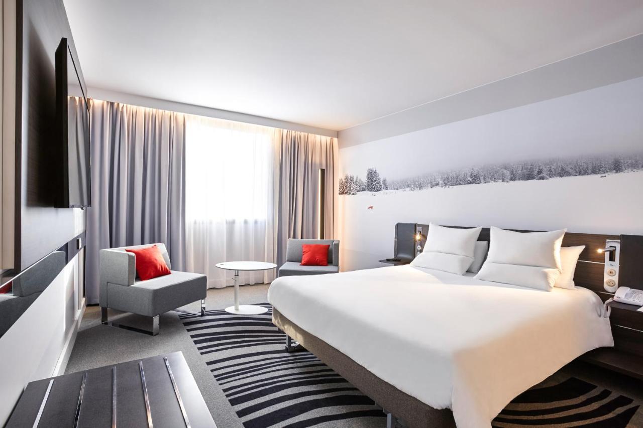Quarto Executivo com Cama Queen-size e Sofá-cama